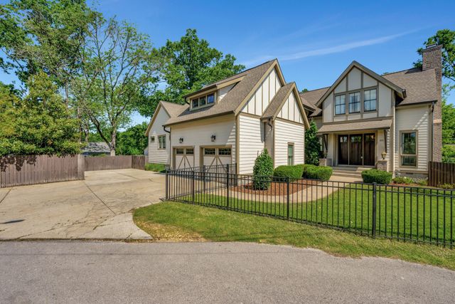 front view of a house and a yard