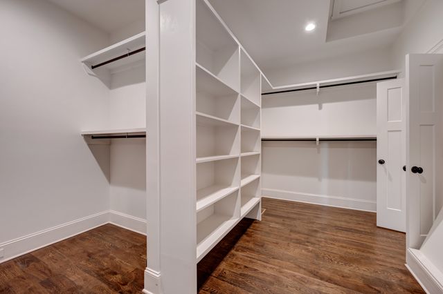 a bathroom with a bathtub and a sink