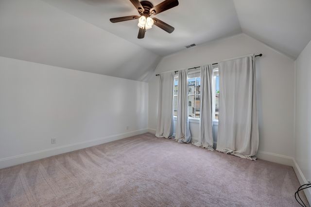 a bathroom with a bathtub sink and mirror