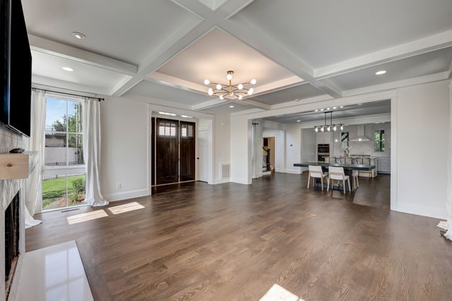a view of dining room with furniture and wooden floor