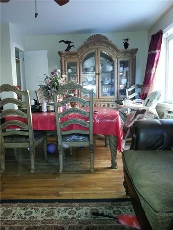a bedroom with furniture and a fireplace