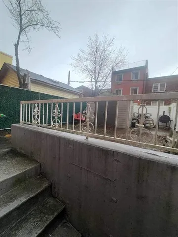 a view of a car park in the back