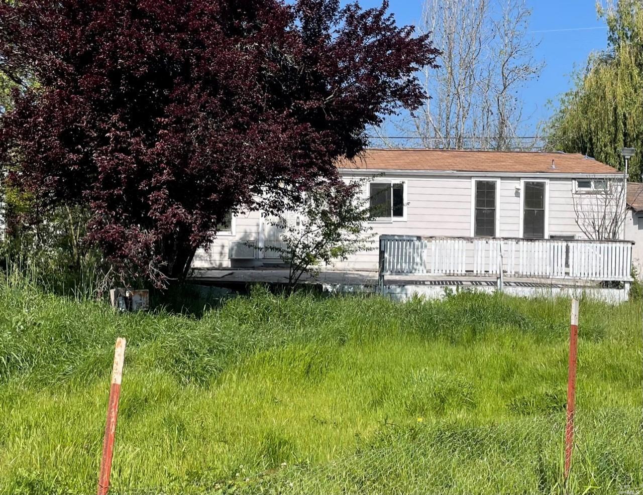 3009 Bloomfield Road Sebastopol, CA 95472 - Photo 1 of 1 a front view of a house with a yard