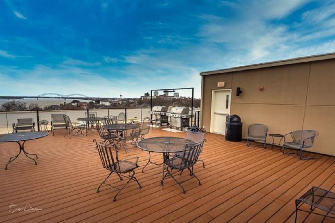 648 Riverside Drive, Unit 319 Memphis, TN 38103 - Photo 16 of 19 a view of a terrace with seating area