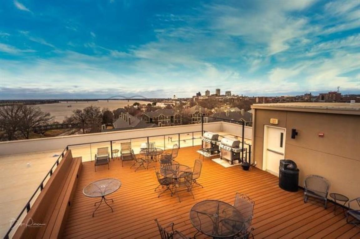 648 Riverside Drive, Unit 319 Memphis, TN 38103 - Photo 17 of 19 a view of a balcony with lounge chair