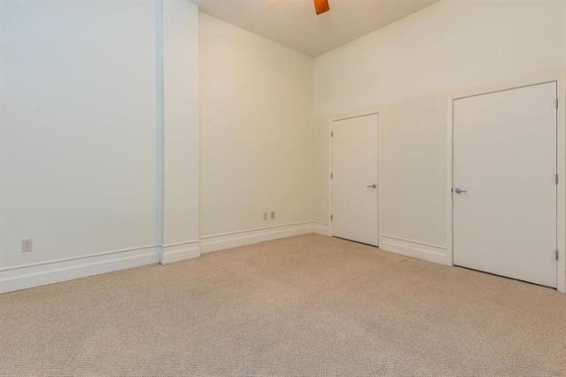 648 Riverside Drive, Unit 319 Memphis, TN 38103 - Photo 7 of 19 an empty room with an entryway