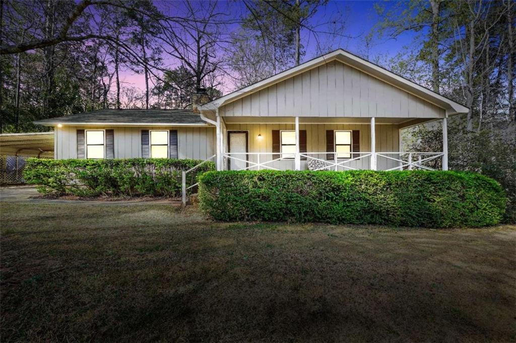 front view of a house with a yard