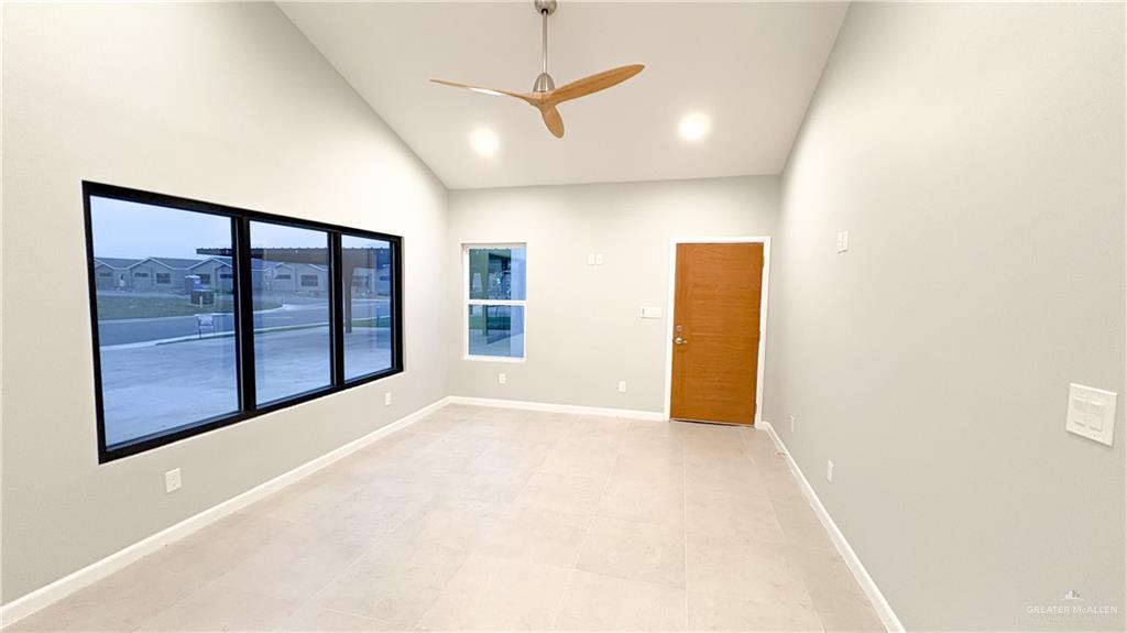 612 Oriole Road Weslaco, TX 78596 - Photo 3 of 16 a view of an empty room with a window
