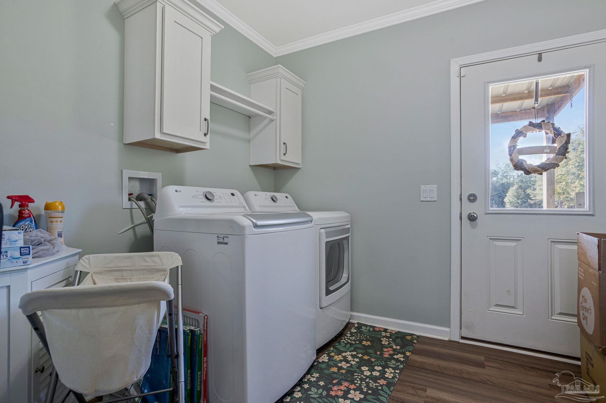 4955 Blue Ribbon Drive Milton, FL 32583 - Photo 30 of 43 a utility room with dryer and washer