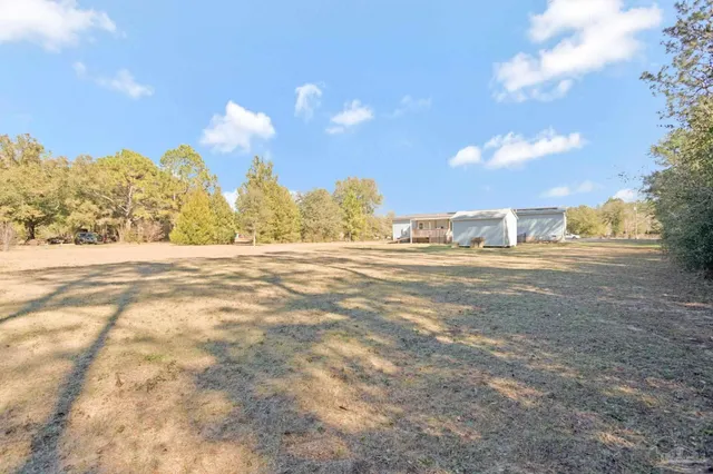 a view of ocean and with trees
