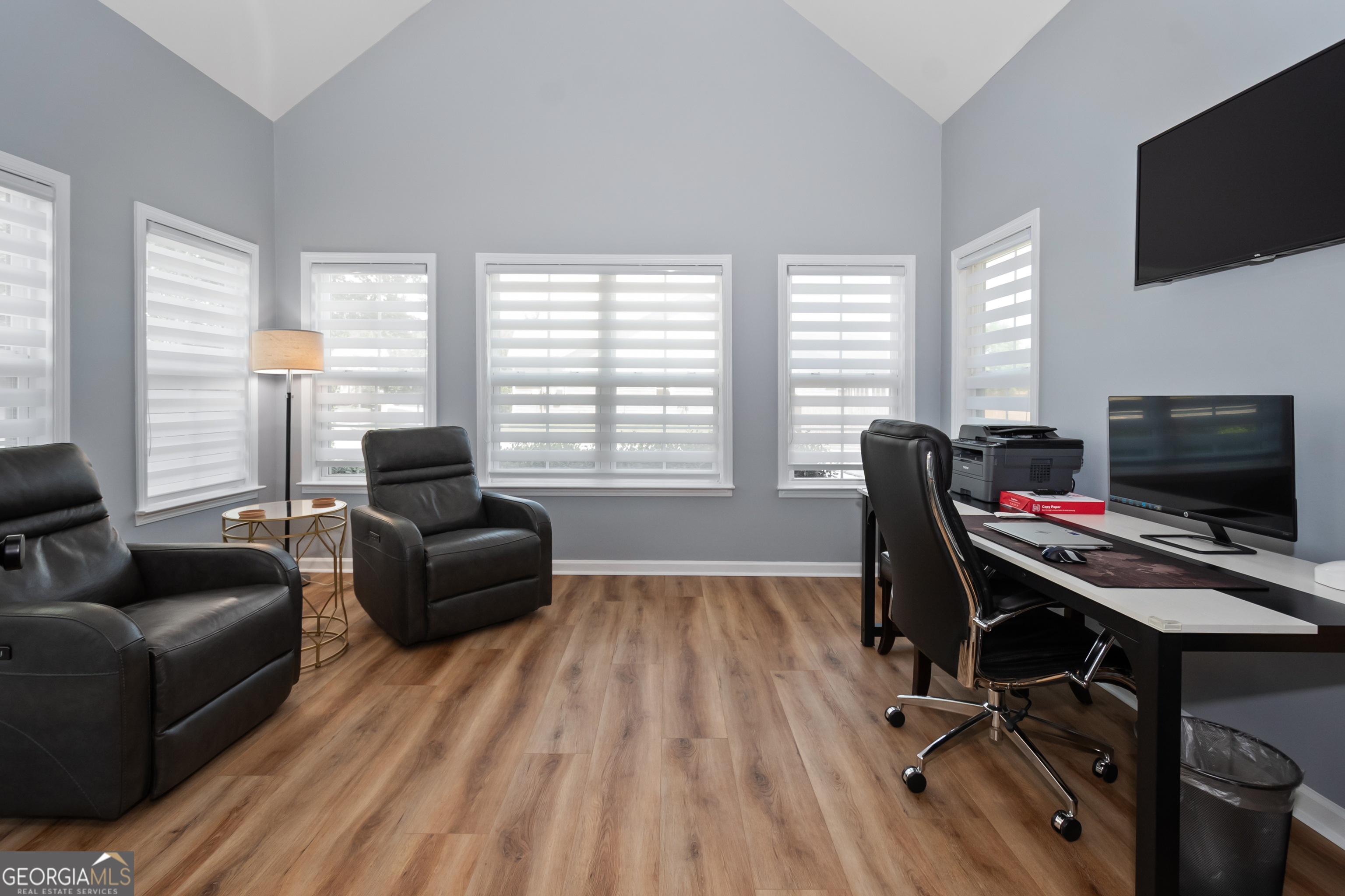 71 Thomaston Street Newnan, GA 30263 - Photo 16 of 38 a view of a livingroom with workspace and a window