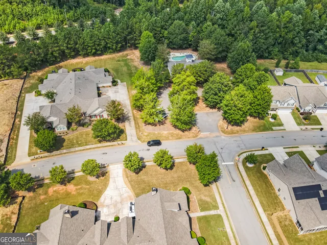an aerial view of a house with garden space sitting space and garden
