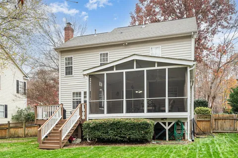 a view of a deck with couches and wooden floor