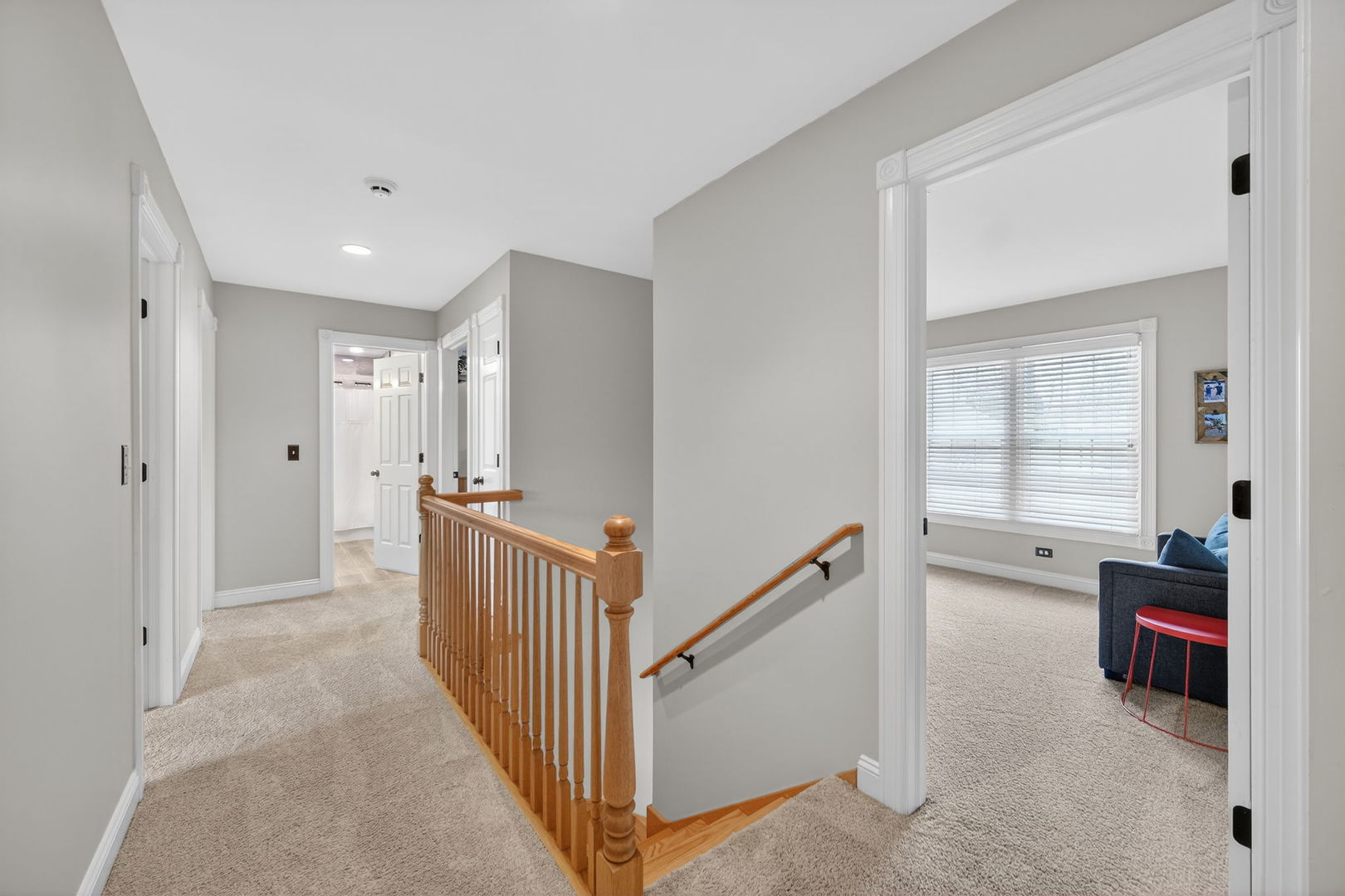 5304 Rita Avenue Crystal Lake, IL 60014 - Photo 28 of 59 a view of a hallway to a livingroom with wooden floor and windows