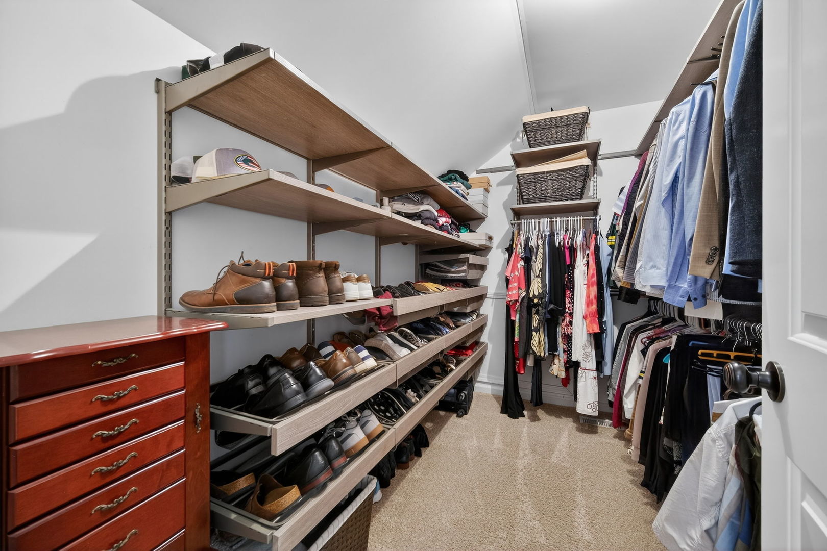 5304 Rita Avenue Crystal Lake, IL 60014 - Photo 34 of 59 a view of walk in closet with clothes and shoes