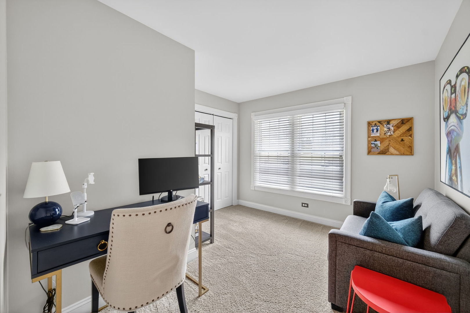 5304 Rita Avenue Crystal Lake, IL 60014 - Photo 35 of 59 a living room with furniture and a flat screen tv