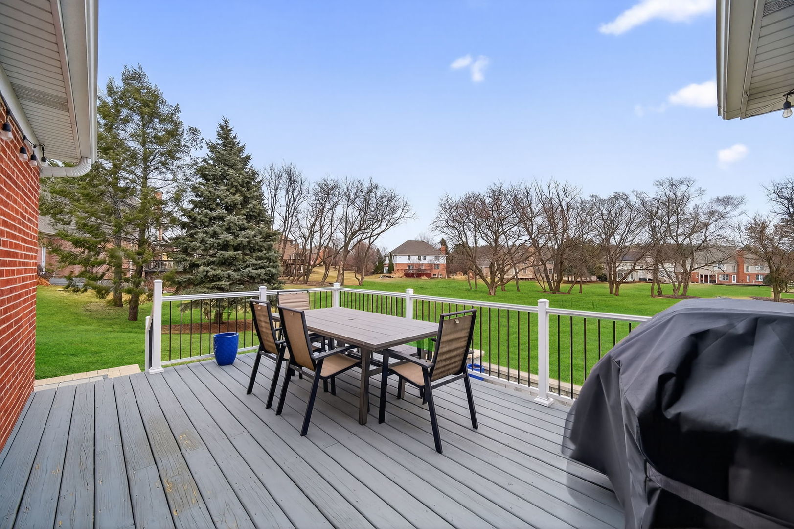5304 Rita Avenue Crystal Lake, IL 60014 - Photo 46 of 59 a view of a dining tables and chairs on the roof deck
