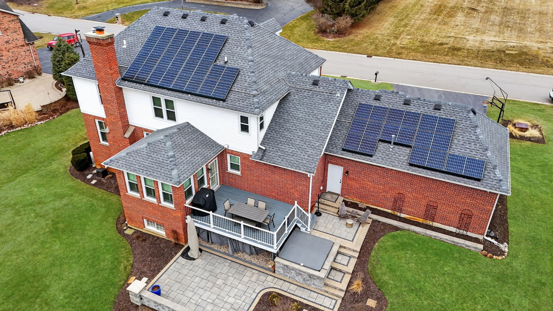 5304 Rita Avenue Crystal Lake, IL 60014 - Photo 5 of 59 an aerial view of a house with roof deck and furniture