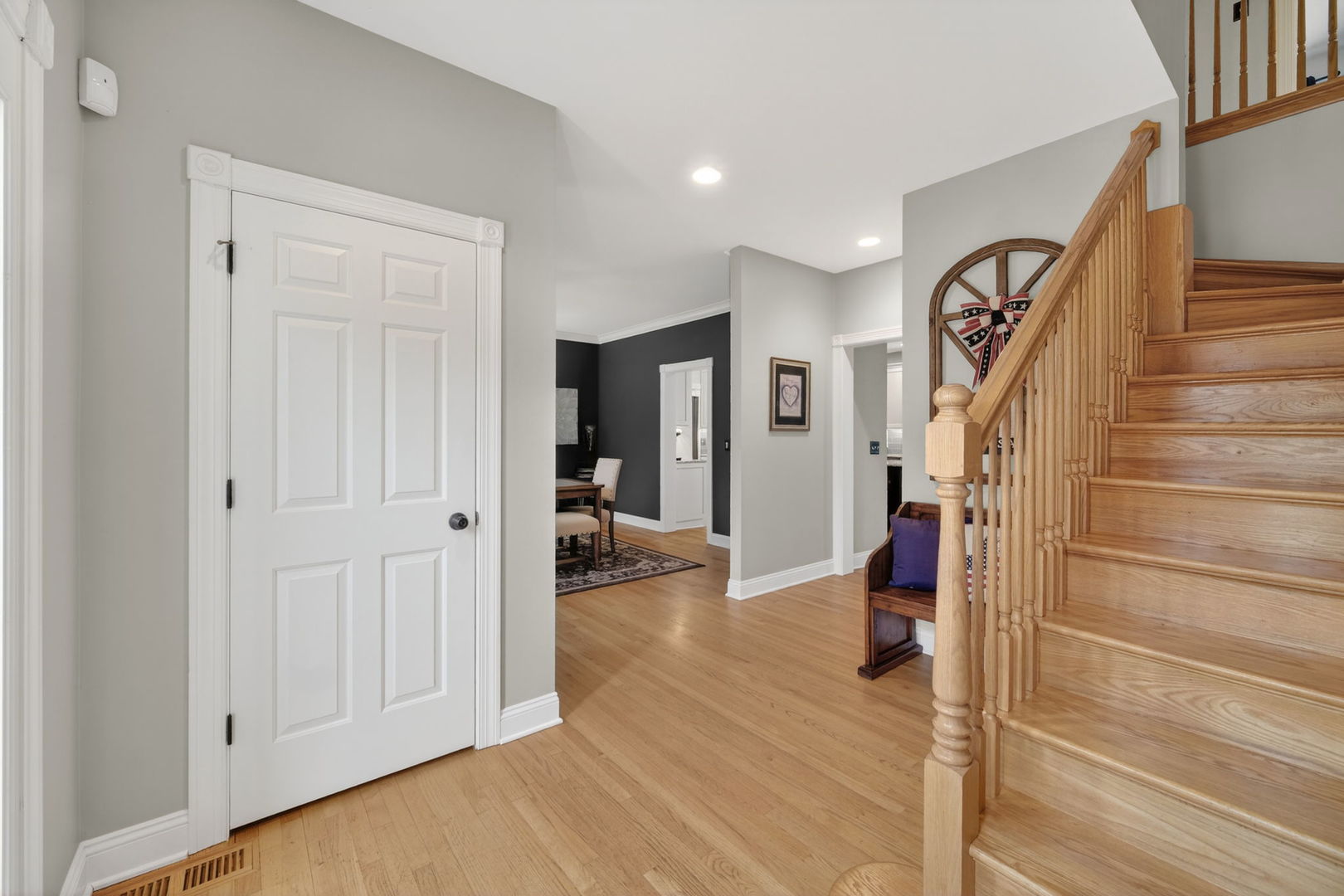 5304 Rita Avenue Crystal Lake, IL 60014 - Photo 7 of 59 a view of a hallway with wooden floor and entryway