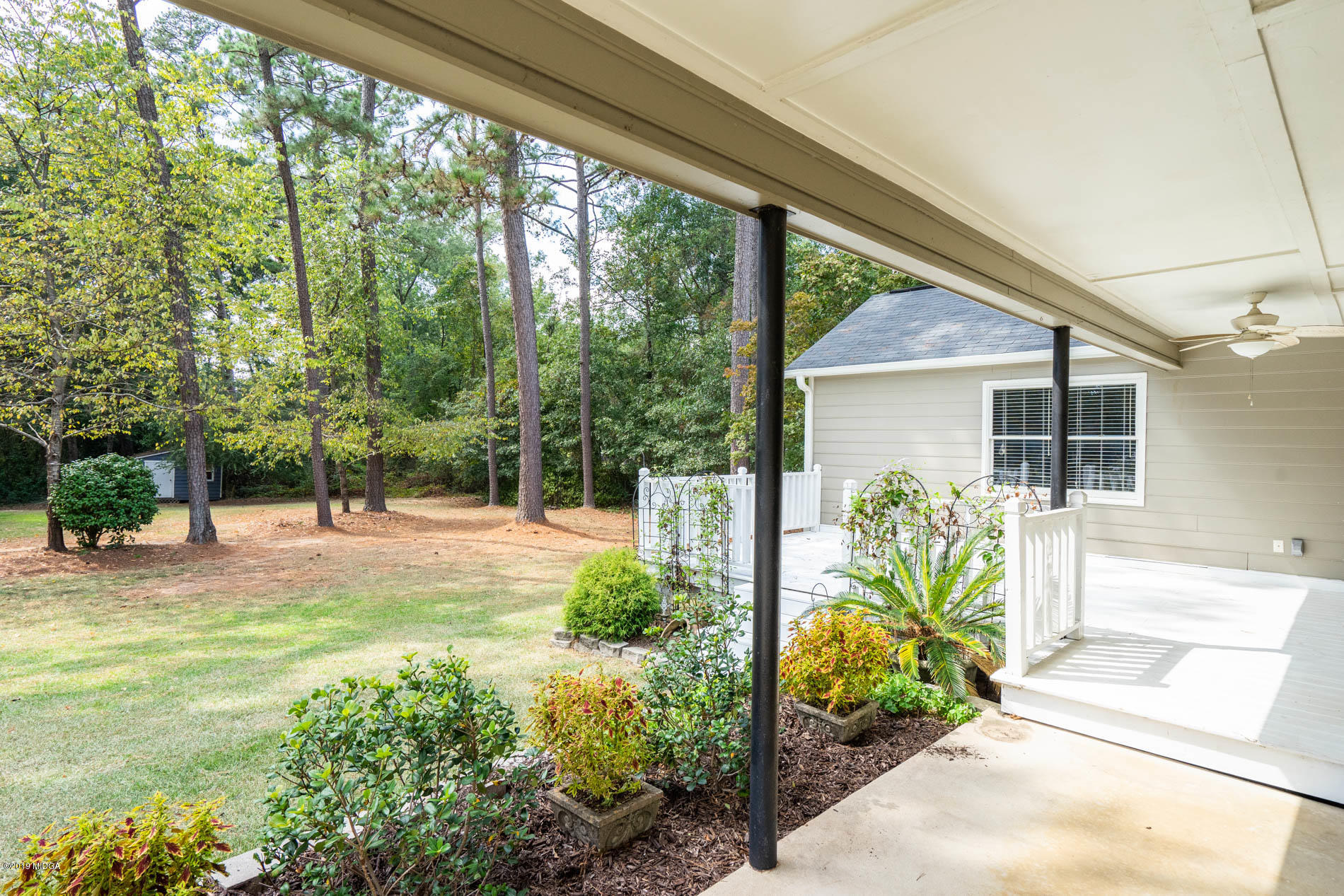 123 Timber Ridge Drive Macon, GA 31216 - Photo 22 of 26 a front view of a house with garden
