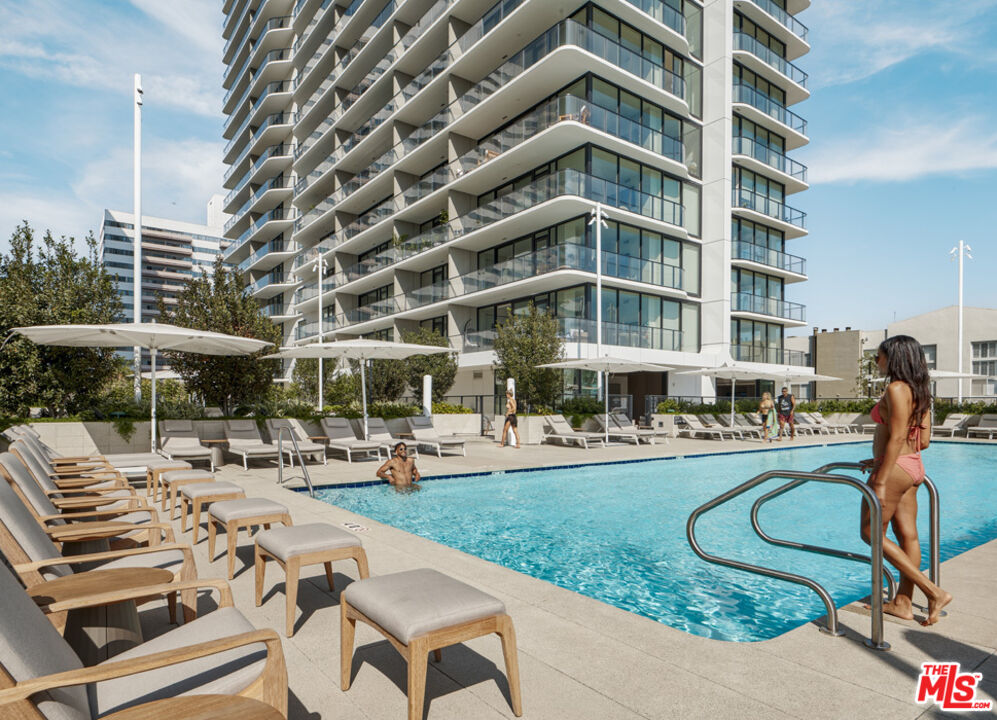 11750 Wilshire Boulevard, Unit 2404 Los Angeles, CA 90025 - Photo 15 of 38 a front view of a building with sitting area