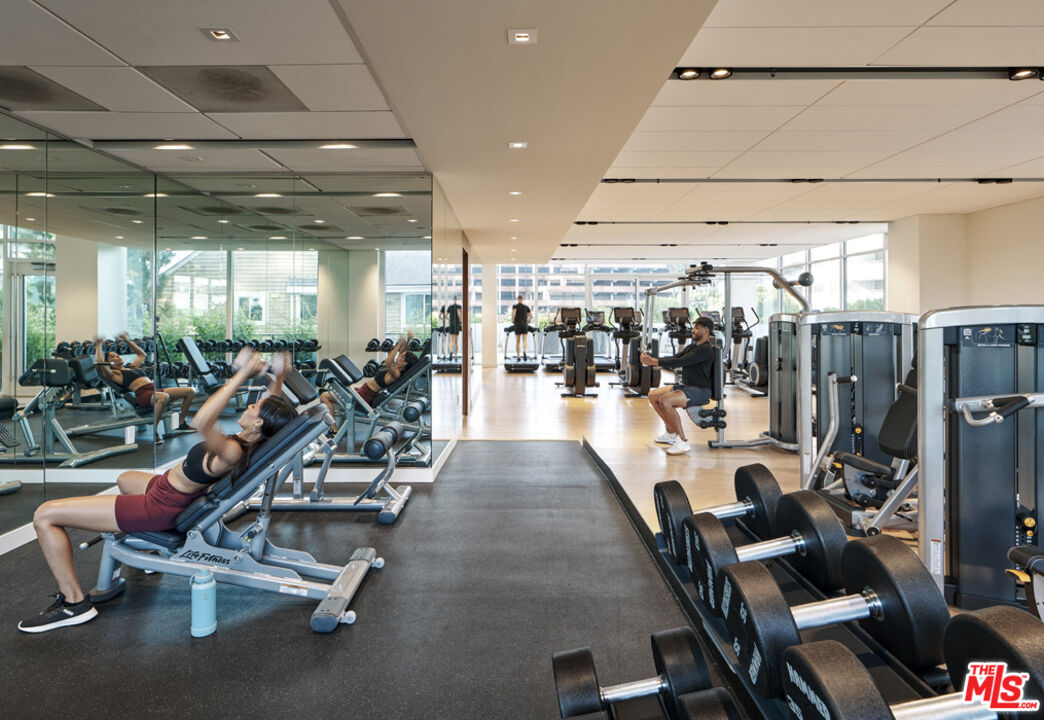 11750 Wilshire Boulevard, Unit 2404 Los Angeles, CA 90025 - Photo 28 of 38 a view of a room with gym equipment