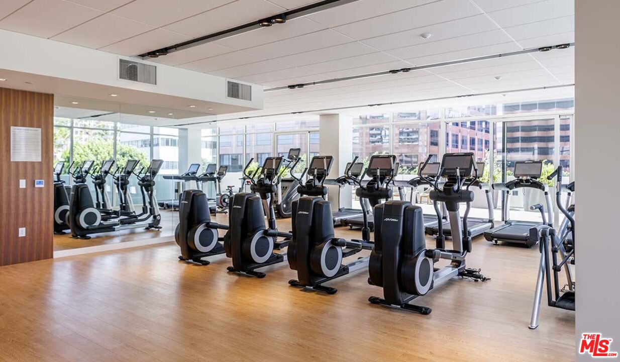11750 Wilshire Boulevard, Unit 2404 Los Angeles, CA 90025 - Photo 30 of 38 a view of a room with gym equipment