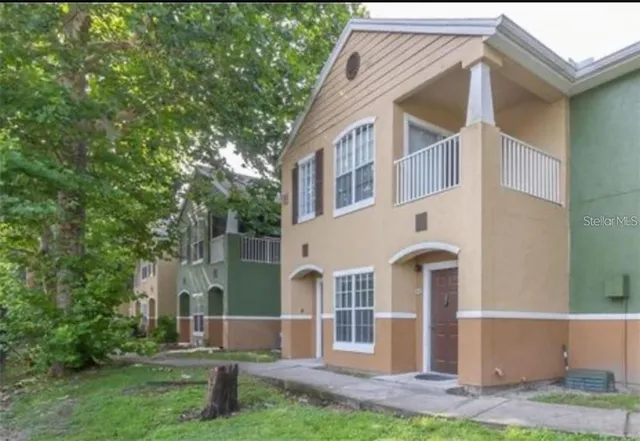 front view of house with a yard