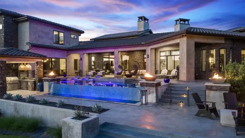 a view of a house with a small yard