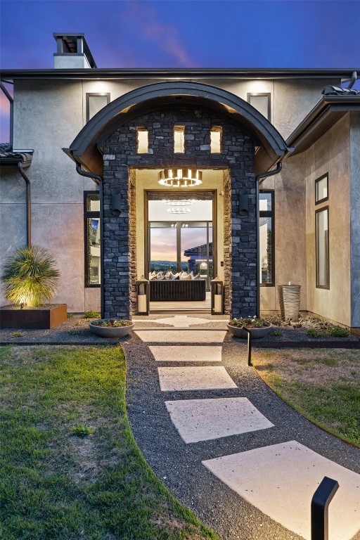 19204 Secretariat Place Spicewood, TX 78669 - Photo 36 of 40 a view of a house with a small yard