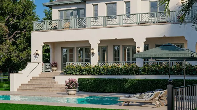 a front view of residential houses with yard
