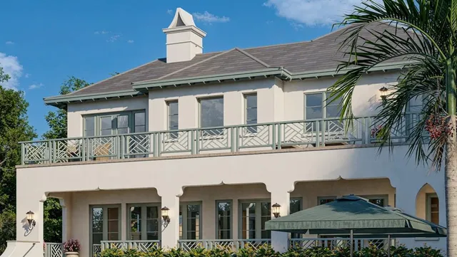 a front view of a house with glass windows