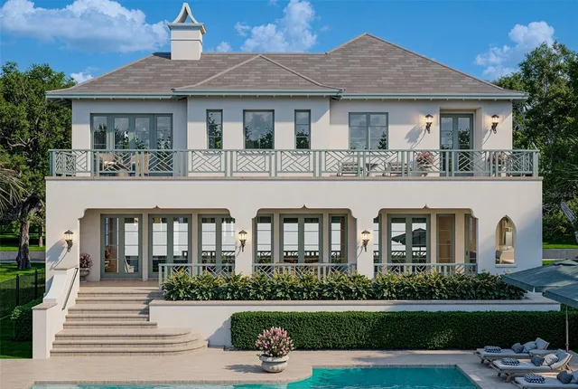 an aerial view of a house with swimming pool garden view and a garden