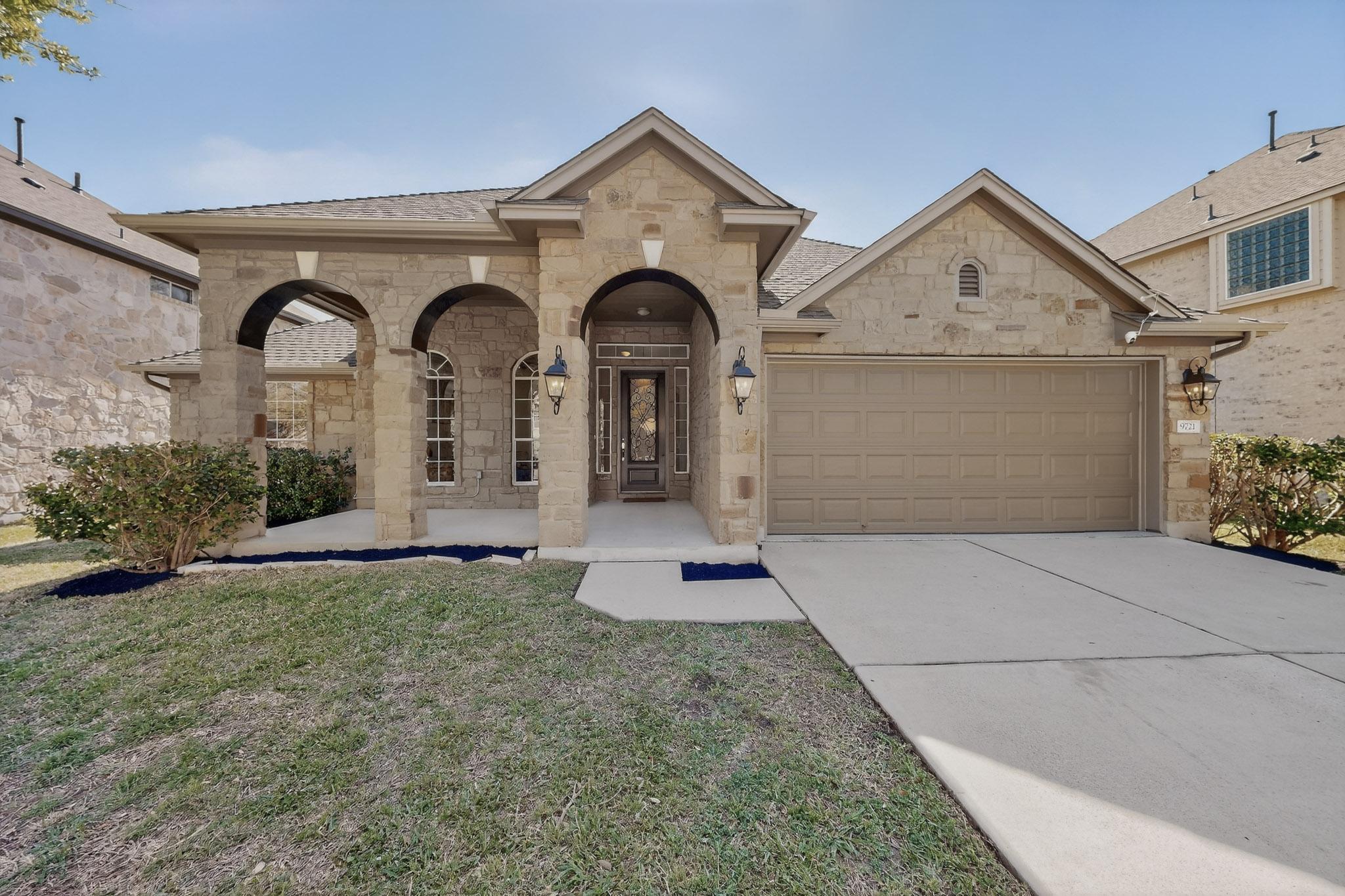 9721 Rias Way Austin, TX 78717 - Photo 1 of 1 a front view of a house with garden