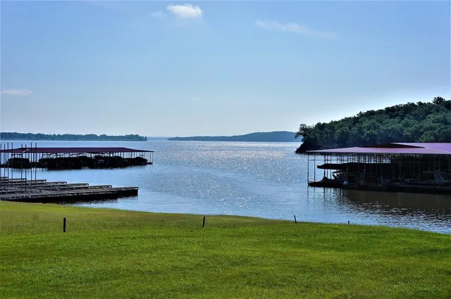 a view of a lake with a big yard