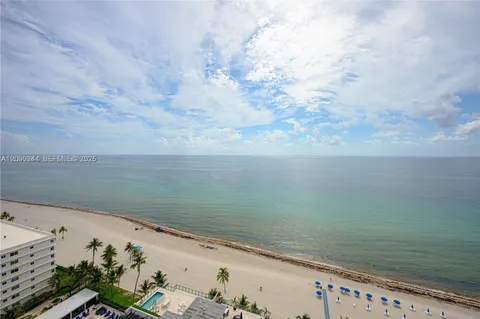 a view of an ocean from a balcony