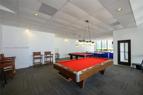 a view of a kitchen and a living room