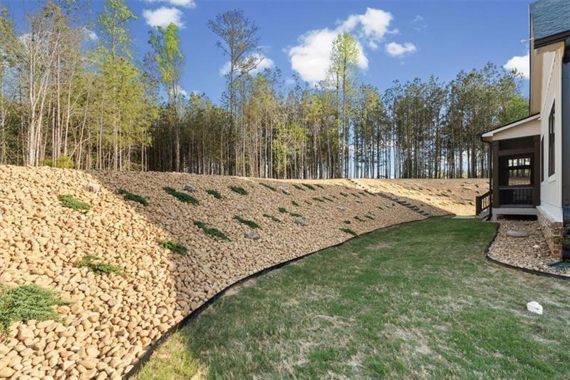 283 London Road Ball Ground, GA 30107 - Photo 54 of 73 a view of a backyard of the house
