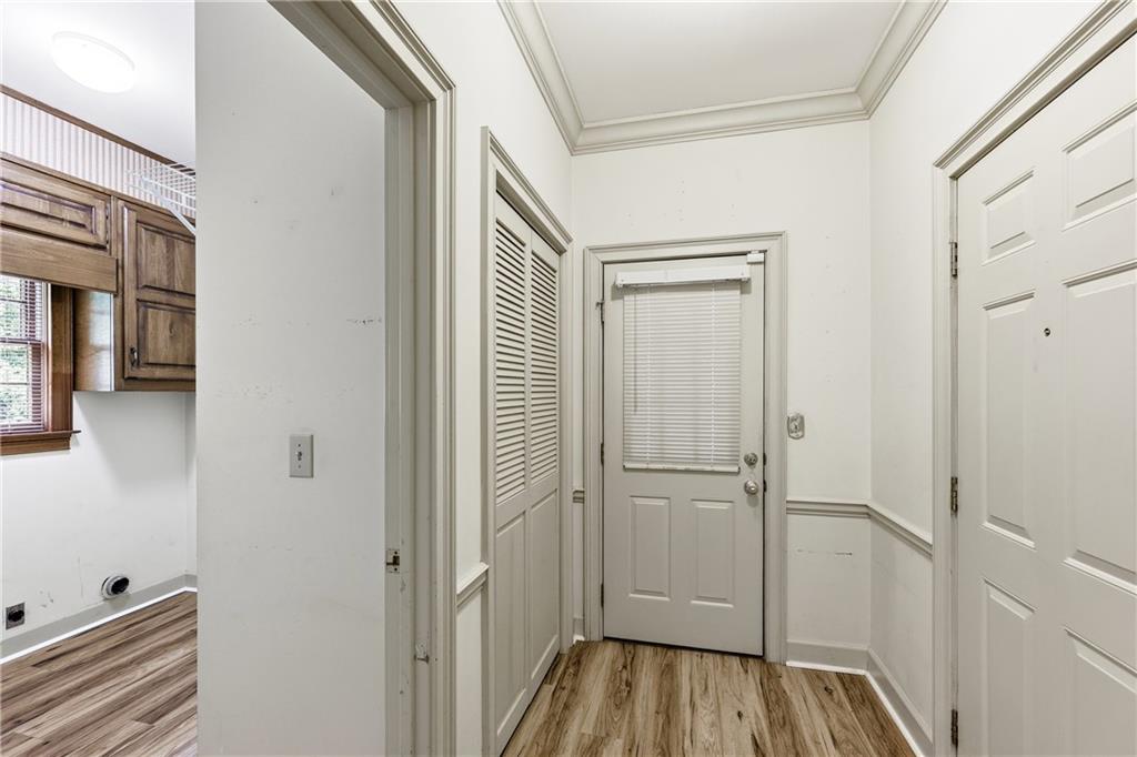 3608 Maple Forge Lane Gainesville, GA 30504 - Photo 16 of 45 a view of a hallway with wooden floor and closet