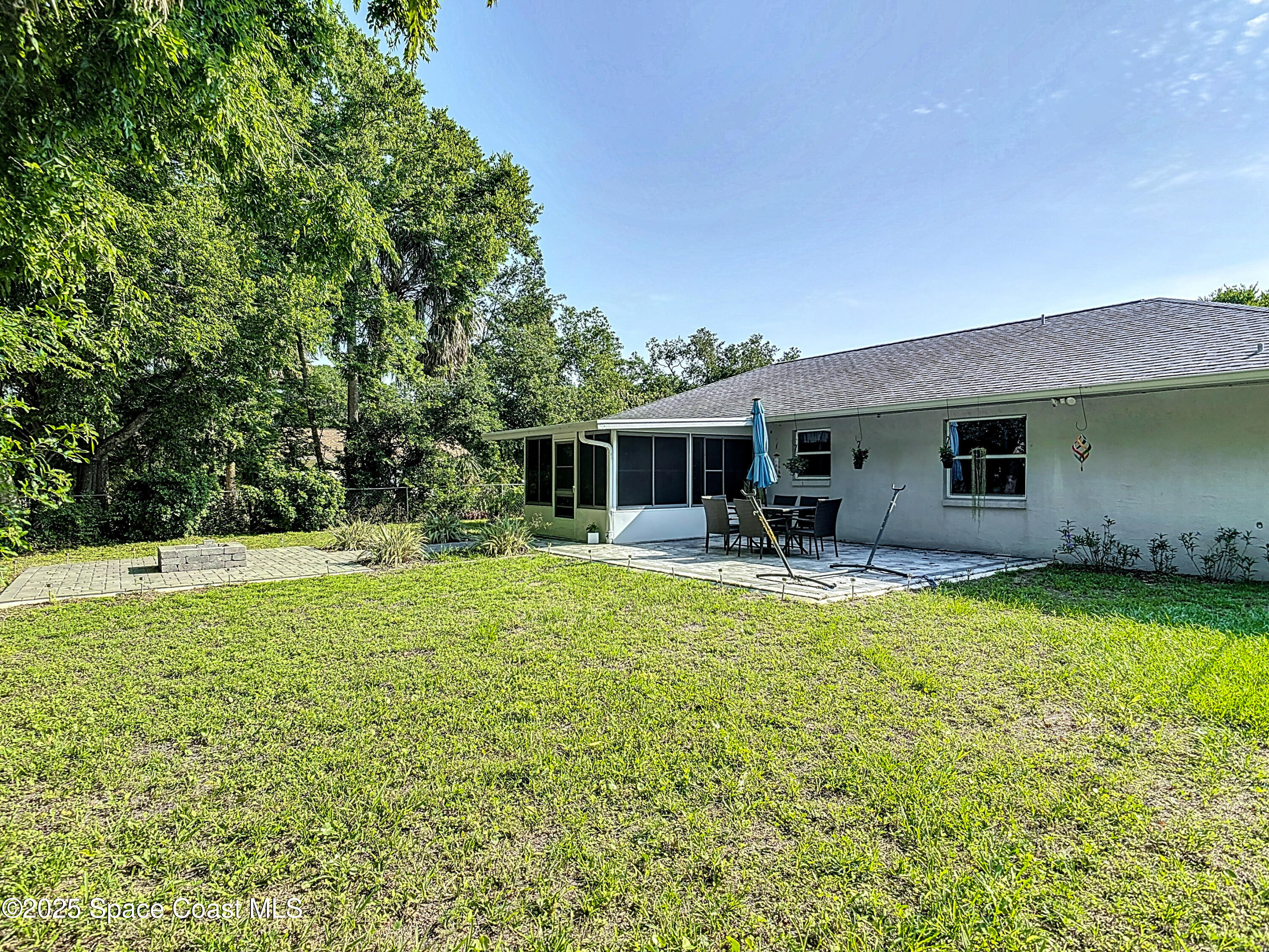 3104 Lime Tree Drive Edgewater, FL 32141 - Photo 25 of 32 a swimming pool view with a seating space