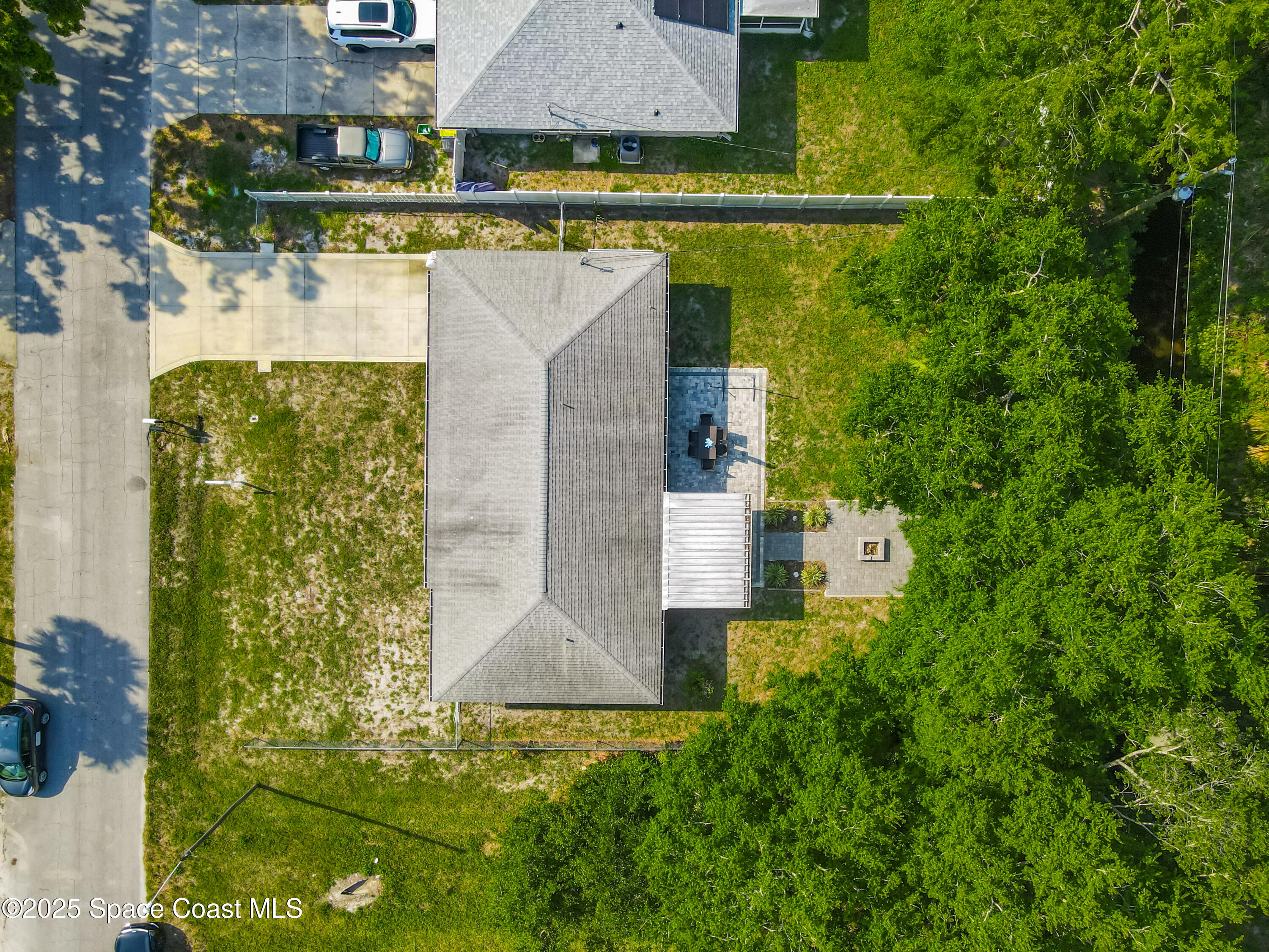 3104 Lime Tree Drive Edgewater, FL 32141 - Photo 29 of 32 an aerial view of a house with a yard