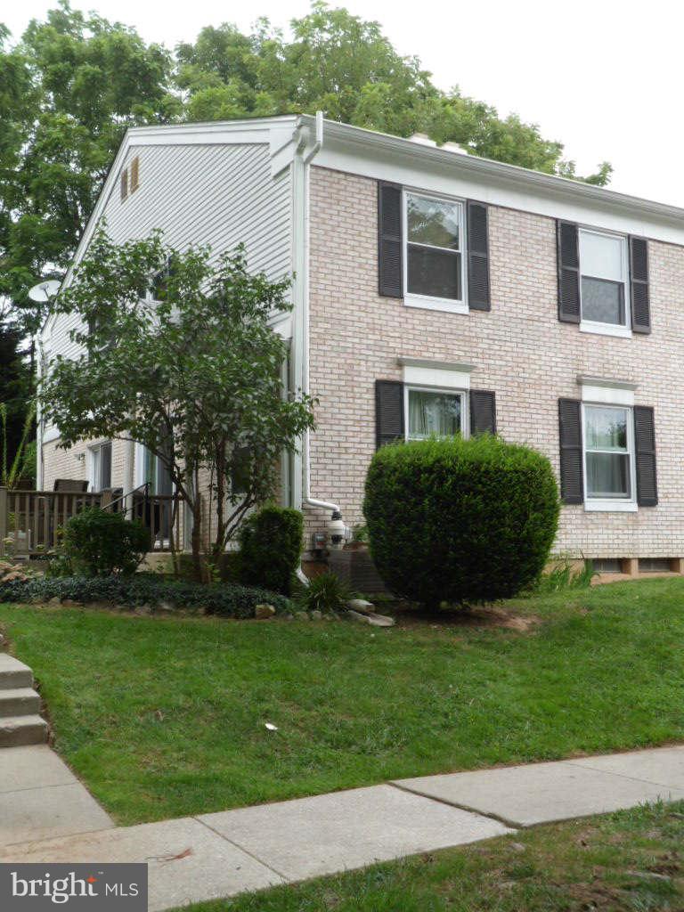 84 Ridgelawn Road, Unit B Reisterstown, MD 21136 - Photo 2 of 17 a view of a house with a yard