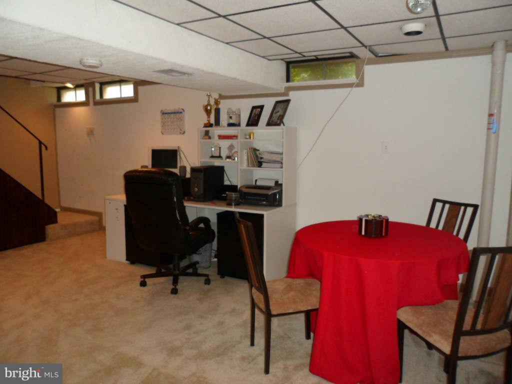84 Ridgelawn Road, Unit B Reisterstown, MD 21136 - Photo 14 of 17 a view of a workspace with furniture