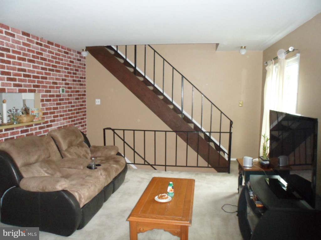 84 Ridgelawn Road, Unit B Reisterstown, MD 21136 - Photo 3 of 17 a living room with furniture