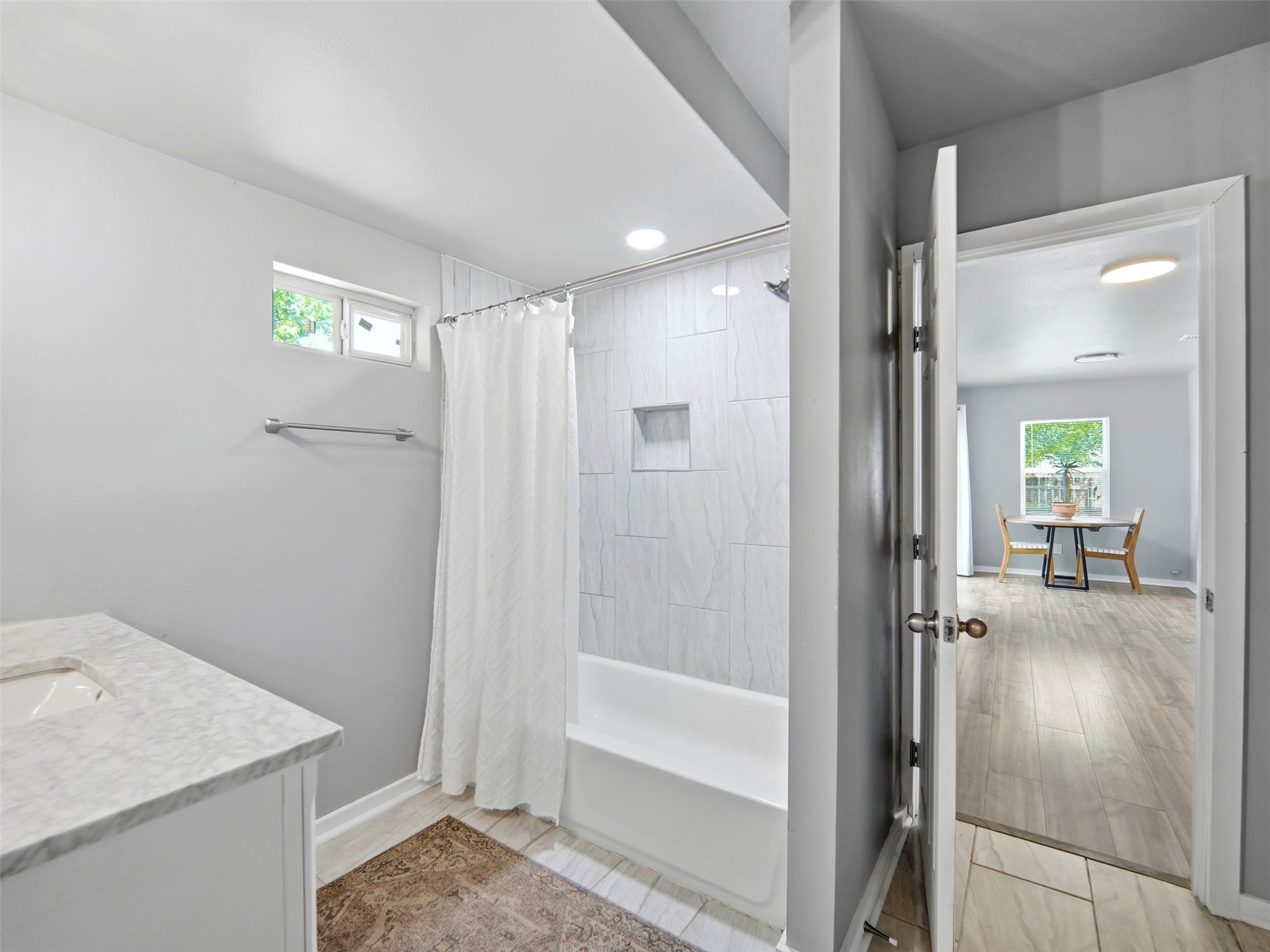 700 9th Street Blanco, TX 78606 - Photo 17 of 33 a bathroom with a sink and shower
