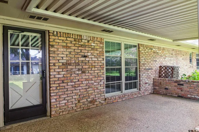 a view of outdoor space and wooden deck