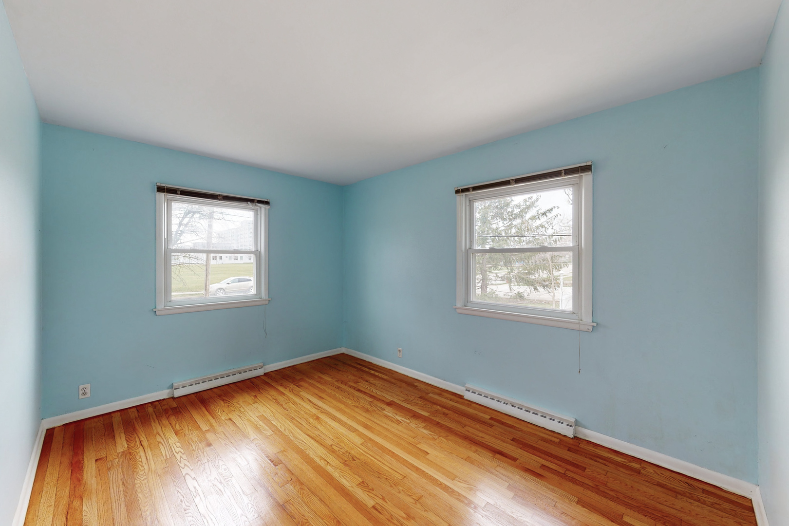 538 Russell Road DeKalb, IL 60115 - Photo 21 of 35 wooden floor in an empty room with a window