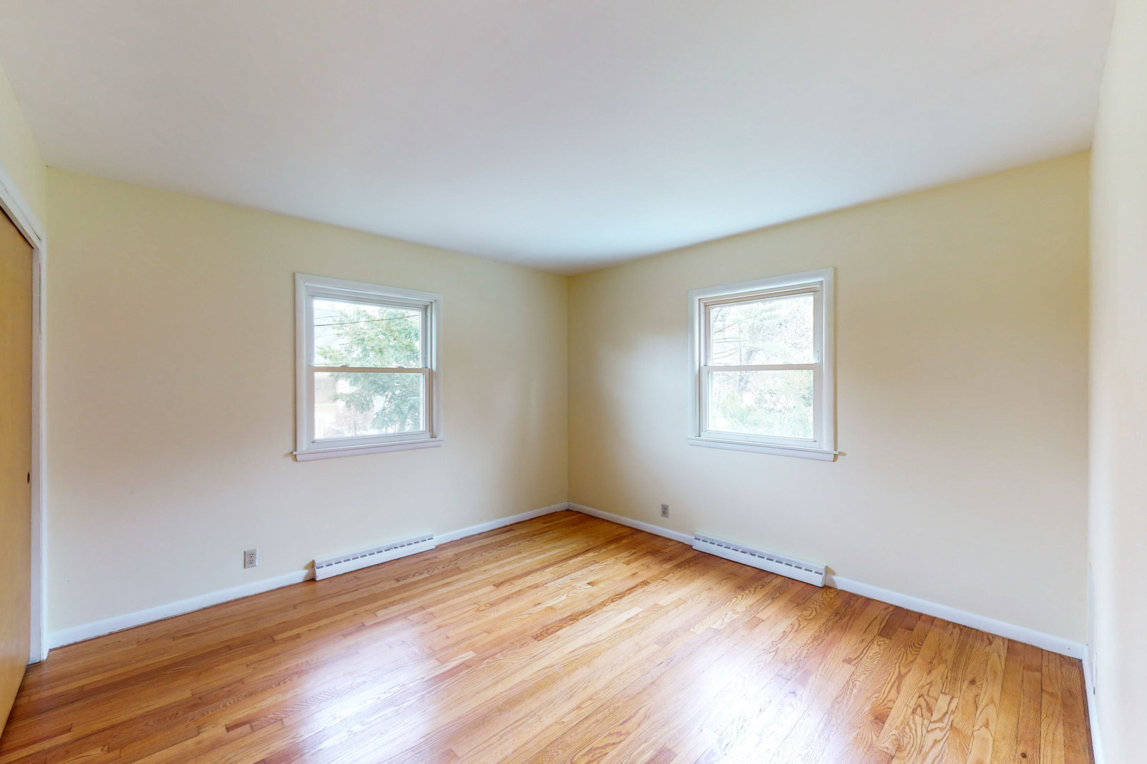 538 Russell Road DeKalb, IL 60115 - Photo 22 of 35 wooden floor in an empty room with a window