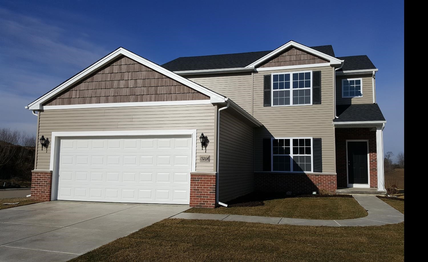 5780 Burr Rdg Circle Crown Point, IN 46307 - Photo 1 of 17 a front view of a house with a yard