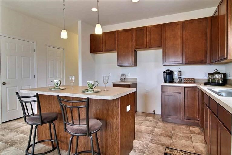 5780 Burr Rdg Circle Crown Point, IN 46307 - Photo 7 of 17 a kitchen with a sink cabinets and window
